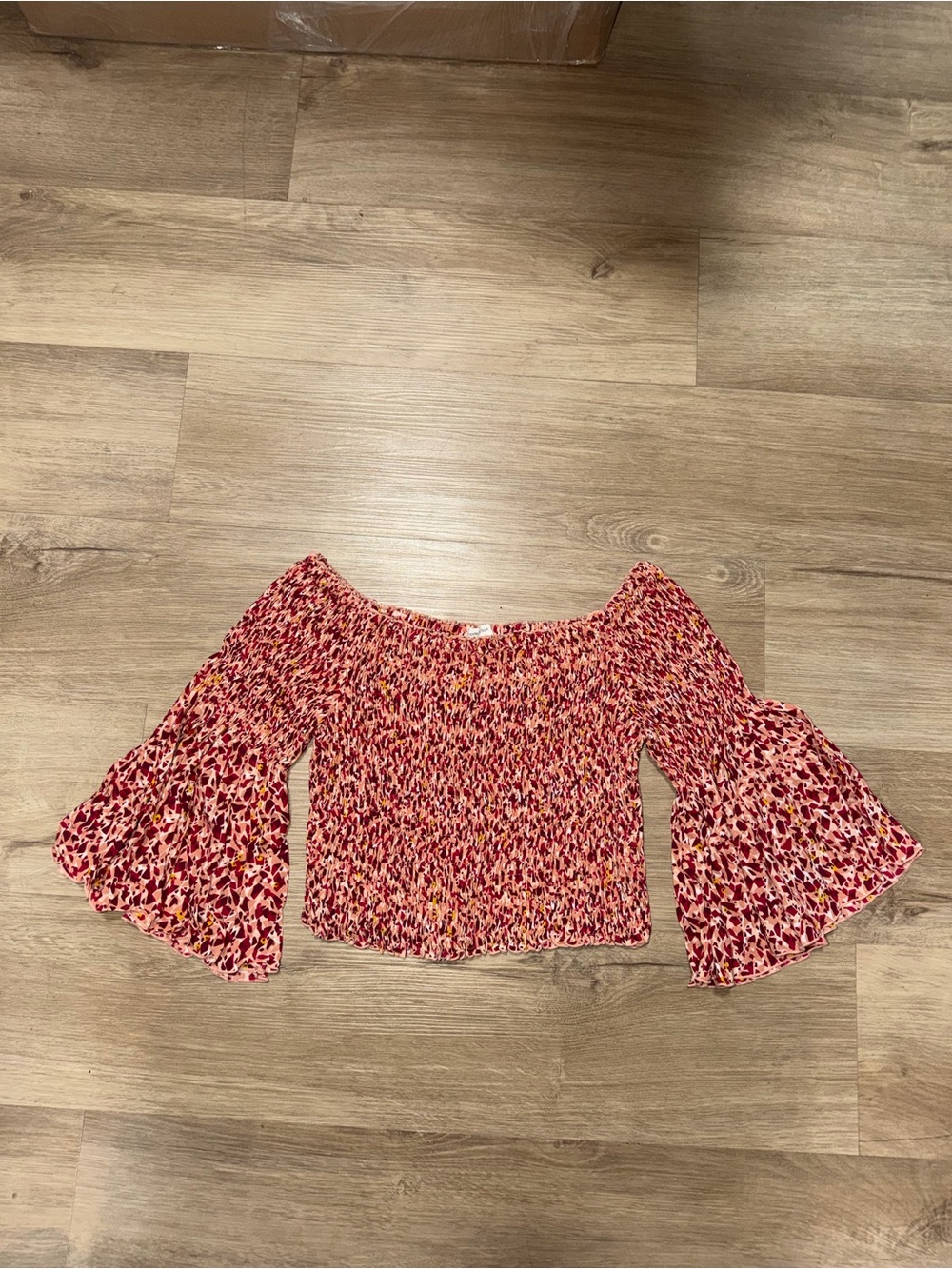 Poupette St. Barth Pink Multi Smocked Off-Shoulder Bell Sleeve Crop Top